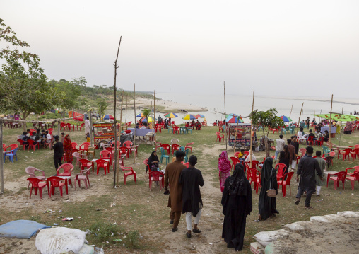 Bangladeshi people in an open air restaurant in Kalitola ghat, Rajshahi Division, Rajshahi, Bangladesh