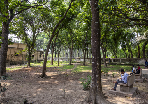 Bangladeshi people sit in Puthia Rajbari palace park, Rajshahi Division, Puthia, Bangladesh