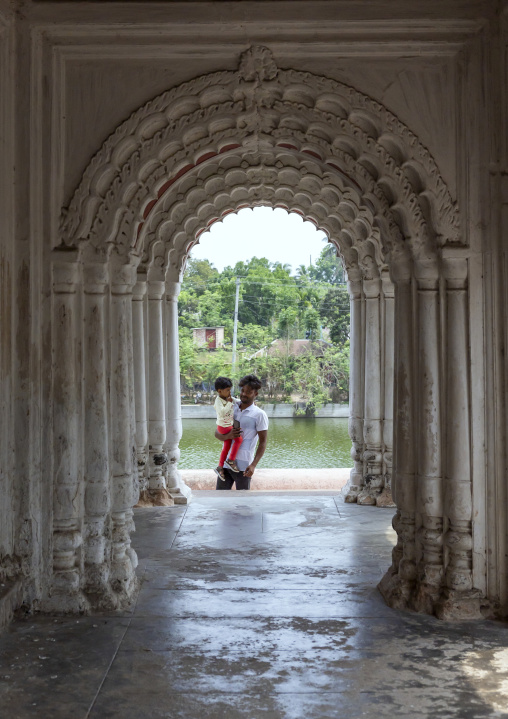 Father and his son in Shiva temple, Rajshahi Division, Puthia, Bangladesh