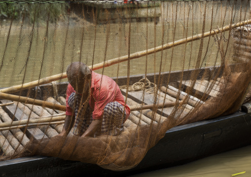 Bangladeshi fishermen use otters to fish in the Sundarbans, Khulna Division, Narail, Bangladesh