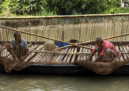 Bangladeshi fishermen use otters to fish in the Sundarbans, Khulna Division, Narail, Bangladesh