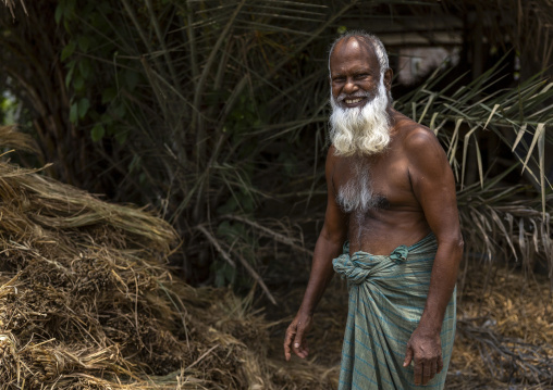 Shirtless bangladeshi elederly man with white beard, Khulna Division, Narail, Bangladesh