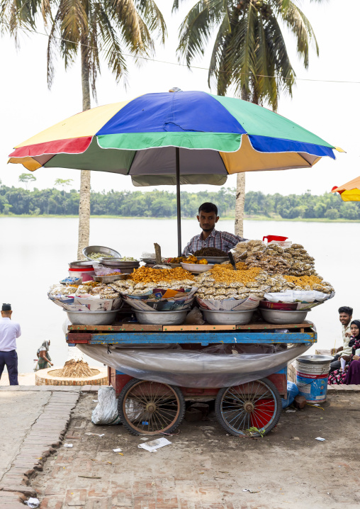 Bangladeshi man selling food in the street, Khulna Division, Bagerhat, Bangladesh