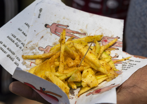 Potatoes wrapped in biology sheets book, Khulna Division, Bagerhat, Bangladesh