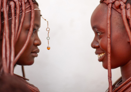 Himba tribe women covered with otjize, Cunene province, Oncocua, Angola