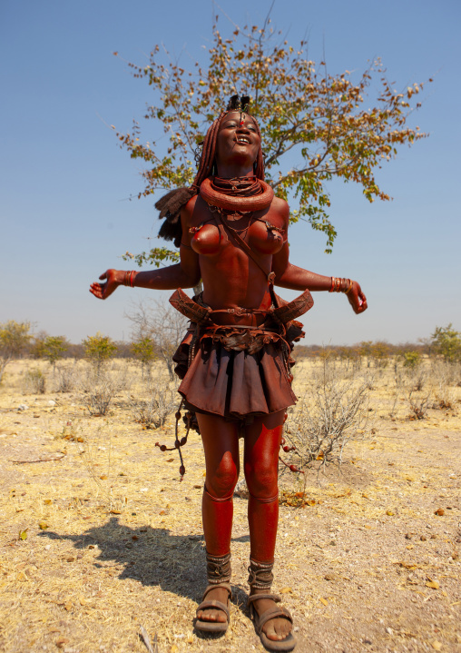 Himba tribe girl dancing, Cunene province, Oncocua, Angola