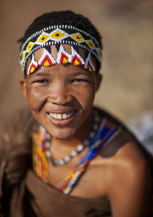 San woman smiling, Otjozondjupa, Tsumkwe, Namibia