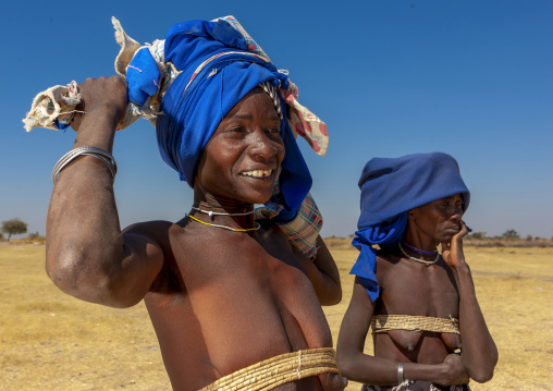 Mucubal tribe women wearing blue headwears, Namibe province, Virei, Angola