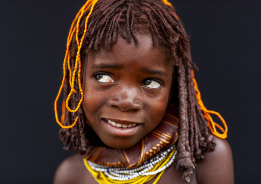 Shy Mwila girl with beaded ornaments, Huila Province, Chibia, Angola