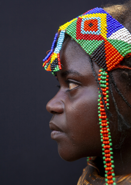 Mwila tribe girl with a vikeka necklace, Huila Province, Chibia, Angola