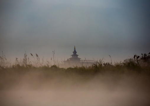 Fog surrounding a temple at morning, Shan State, Inle Lake, Myanmar