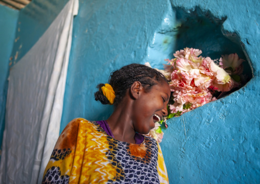 Laughing girl in an harari old house, Harari Region, Harar, Ethiopia
