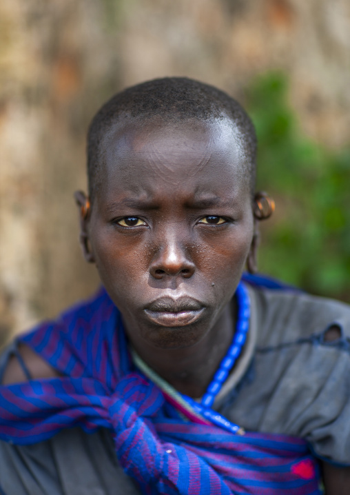 Tama tribe woman with scarifications on the forehead, Omo valley, Tum, Ethiopia