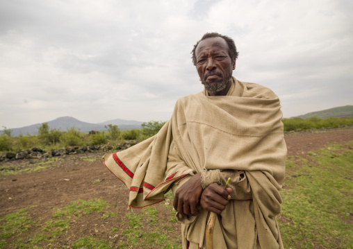 Portrait of a Karrayyu man wrapped in his white shawl, Oromia, Metahara, Ethiopia