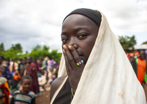 Veiled Dizi tribe girl with a shawl on the head, Omo Valley, Tum, Ethiopia