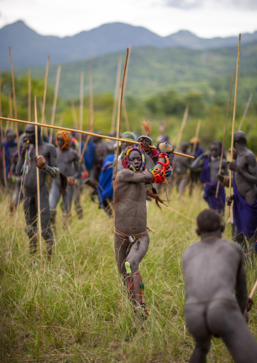 Warriors during Donga stick fighting in Surma tribe, Omo valley, Kibish, Ethiopia