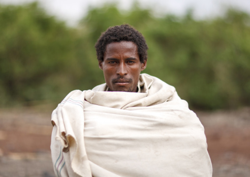 Portrait of a Karrayyu man wrapped in his white shawl, Oromia, Metahara, Ethiopia