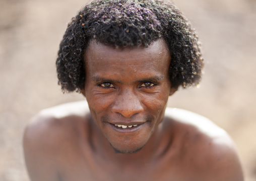 Portrait of a Karrayyu man with traditional hairstyle, Oromia, Metahara, Ethiopia
