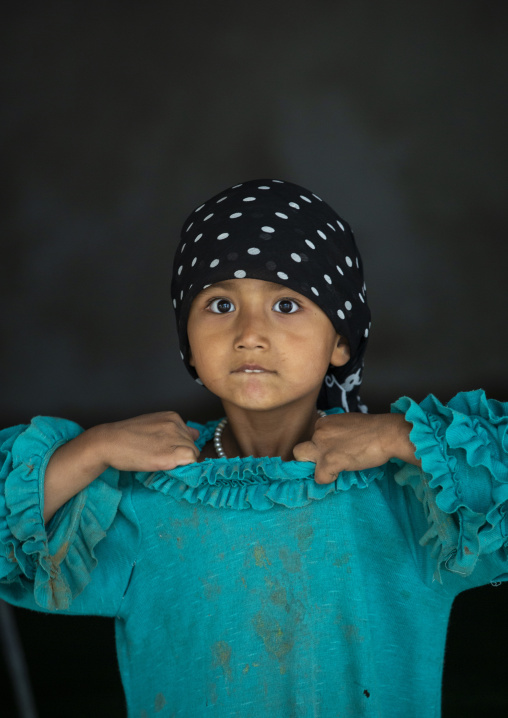 Portrait of an uyghur girl, Xinjiang Uyghur Autonomous Region, Taklamakan desert, China