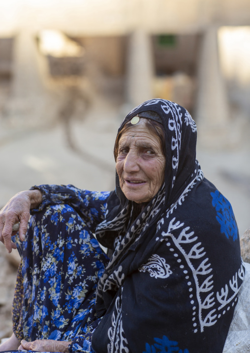 Portrait of a kurdish old woman in traditional clothing, Kordestan province, Palangan, iran