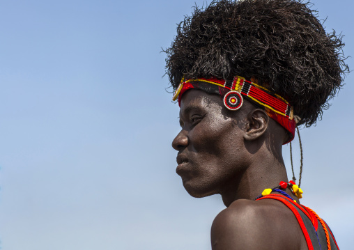 Turkana man with headwear made of ostrich black feathers, Turkana lake, Loiyangalani, Kenya