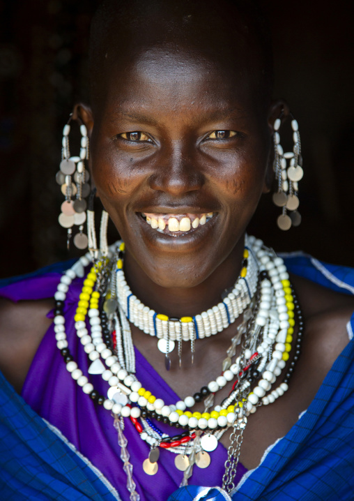 Tanzania, Ashura region, Ngorongoro, Maasai woman with colorful pearl jewellery