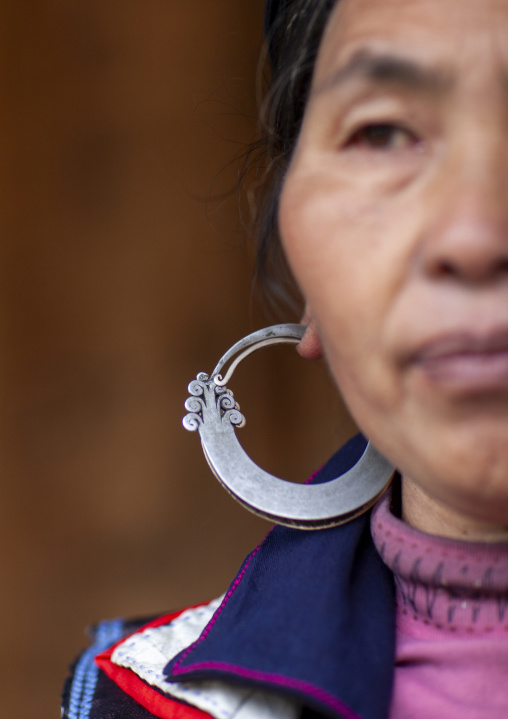 Black Hmong woman with traditional silver earrings, Lao Cai province, Sapa, Vietnam