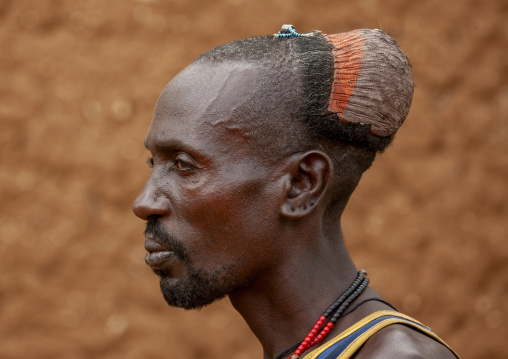 Portrait of Hamer tribe man with mud bun, Turmi, Omo valley, Ethiopia