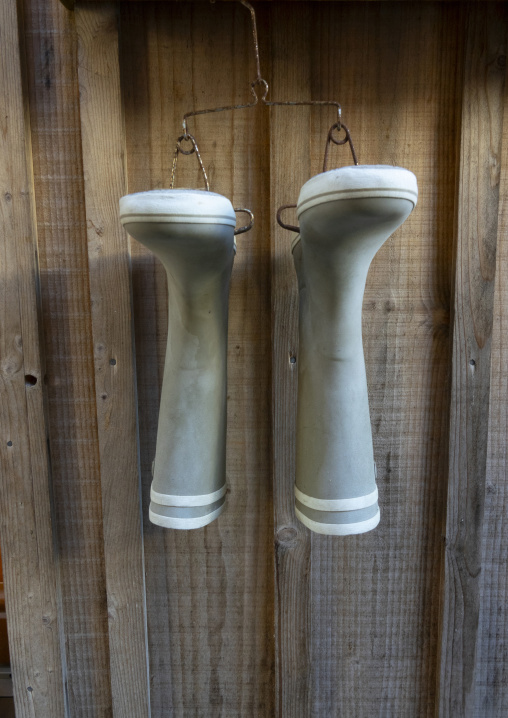 Oyster farmer boots drying after work, Nouvelle-aquitaine, Cap Ferret, France