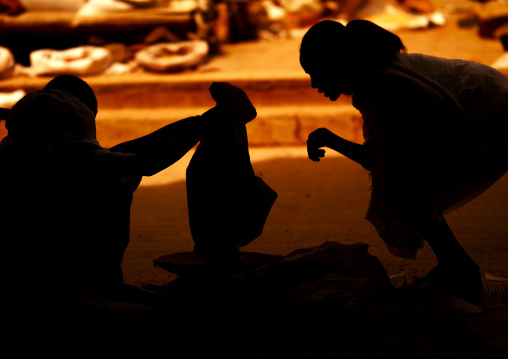 Eritrean women silhouettes at the market, Debub, Mendefera, Eritrea