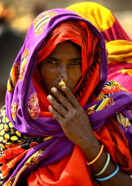 Eritrean woman with nose ring in colorful clothes, Debub, Senafe, Eritrea