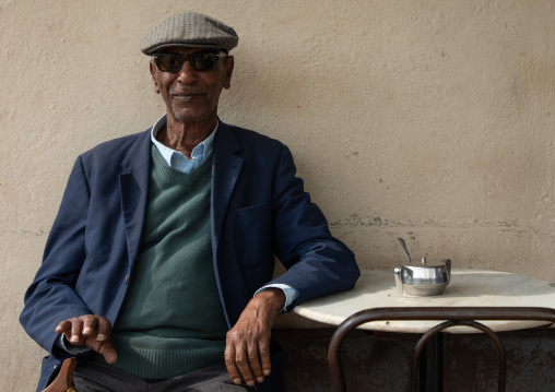 Old eritrean man in a bar, Central region, Asmara, Eritrea