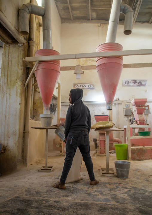 Eritrean people bringing grains to grind in a mill, Central region, Asmara, Eritrea