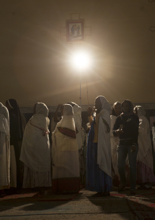 Eritrean people praying in a church, Central Region, Asmara, Eritrea
