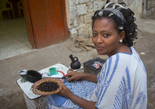 Eritrean preparing coffee in the street, Northern Red Sea, Massawa, Eritrea