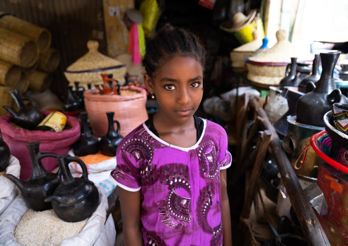 Ethiopian girl selling coffee pots in the market, Dire Dawa Region, Dire Dawa, Ethiopia