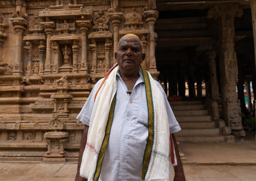 Man with sandalwood paste on shaved head in Sri Ranganathaswamy, Tamil Nadu, Tiruchirappalli, India