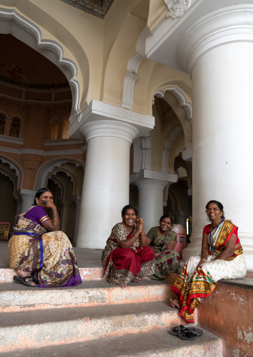 Women in the Pillared hall of Thirumalai Nayakar Palace, Tamil Nadu, Madurai, India