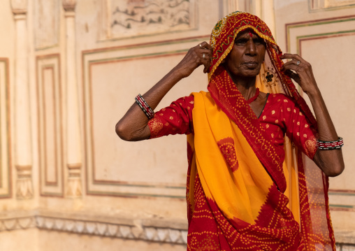 Rajasthani woman in Galtaji temple aka monkey temple, Rajasthan, Jaipur, India