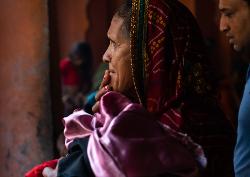 Indian woman in Galtaji temple aka monkey temple, Rajasthan, Jaipur, India