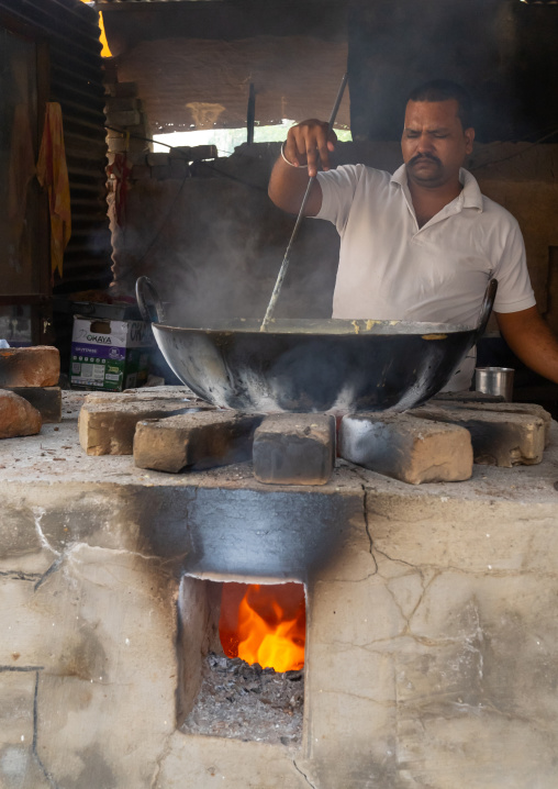 Indian man making sweets, Rajasthan, Bissau, India