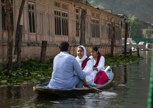Kashmiri girls going to school by boat, Jammu and Kashmir, Srinagar, India