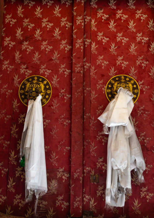 khatas tied to Shey Monastery red door, Ladakh, Shey, India