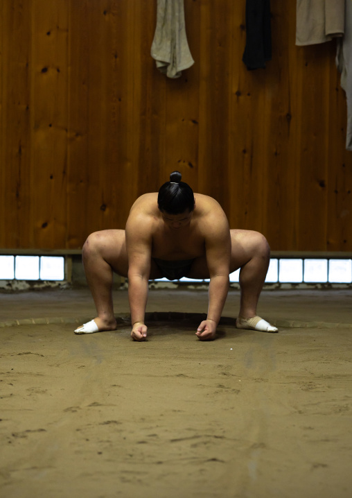 Sumo wrestler training in Tatsunami Beya sumo stable, Kanto region, Tokyo, Japan