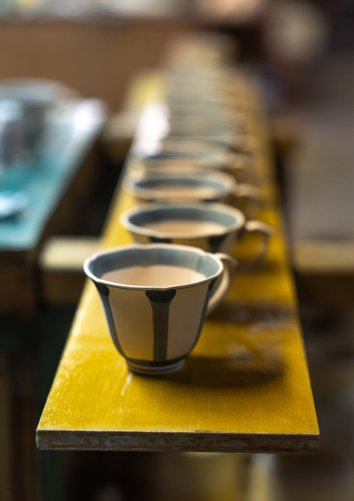 Cups in Kouraku Kiln porcelain atelier, Kyushu region, Arita, Japan