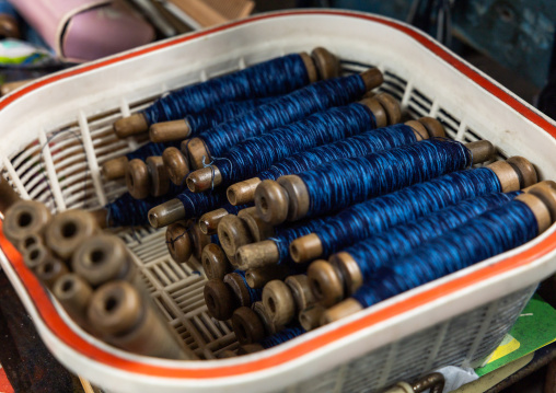 Kurume Kasuri reels in Aika Tanaka Kasuri Kobo workshop, Kyushu region, Chikugo, Japan