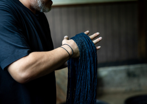 Kurume Kasuri indigo dyeing process in Aika Tanaka Kasuri Kobo workshop, Kyushu region, Chikugo, Japan