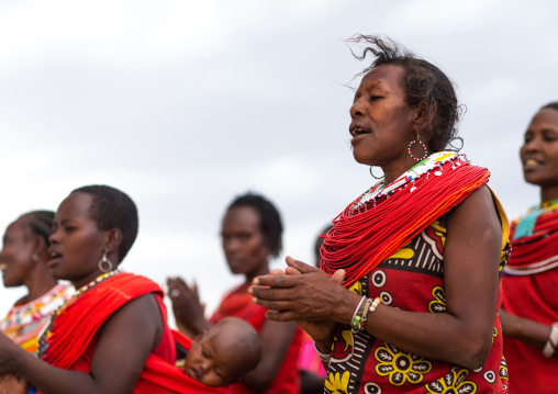 Samburu women dancing with huge necklaces, Samburu County, Samburu National Reserve, Kenya