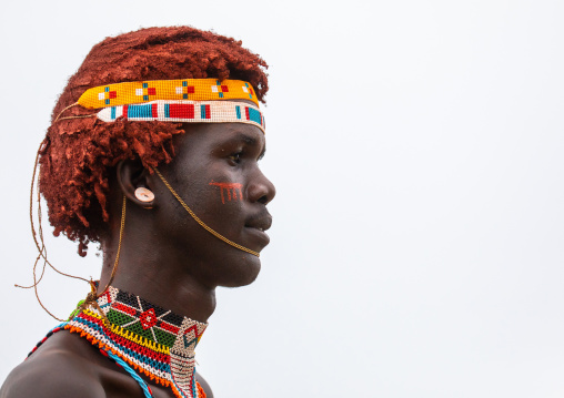 Portrait of a young samburu moran, Samburu County, Samburu National Reserve, Kenya