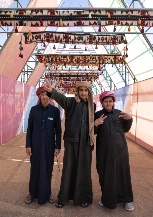 Teenage boys in King Abdul Aziz Camel Festival, Riyadh Province, Rimah, Saudi Arabia
